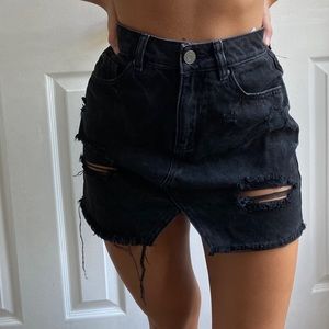 Black distressed jean skirt